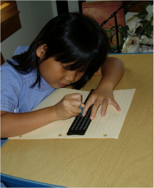 Girl Writing With Braille